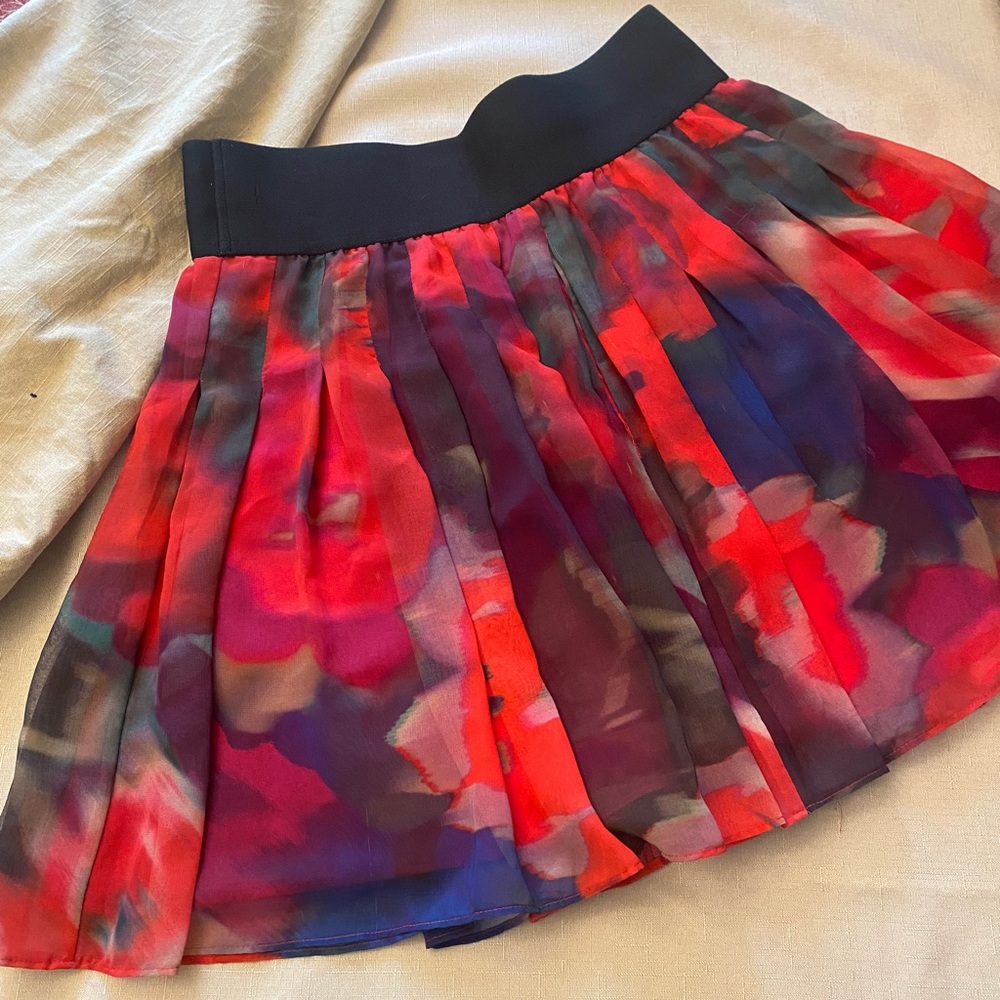 Express floral mini skirt with elastic waistband, size S/M